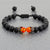 Bracelet Lave - Pierre Naturelle de Protections et Élégance breloque couronne Œil de Tigre